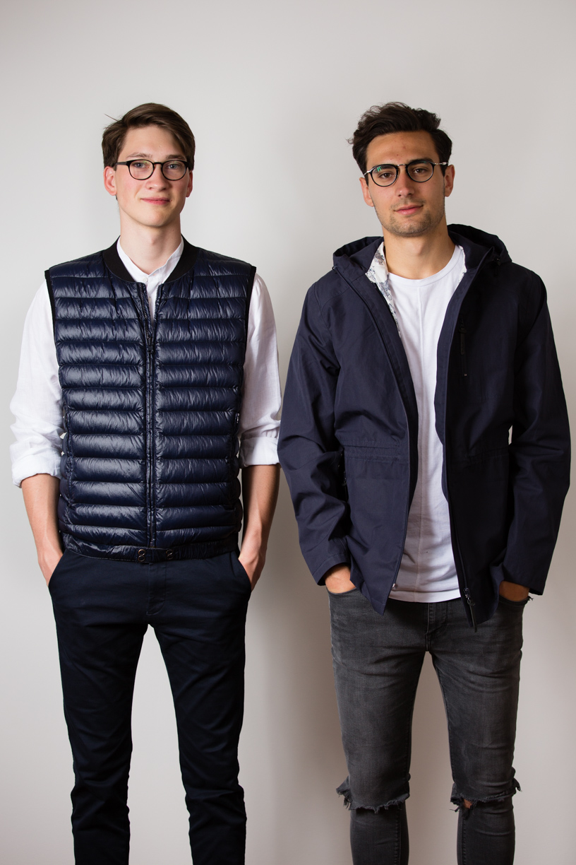 Clemens wearing the garment dyed goose down liner vest and Manu wearing die EtaProof Pioneer Jacket